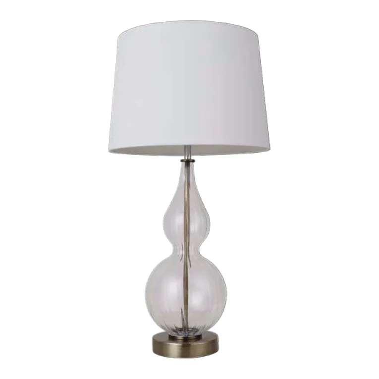 Lexi Lighting Evaine Table Lamp in White/Antique Brass
